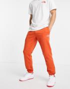 The North Face Leg Graphic Sweatpants In Rust-orange