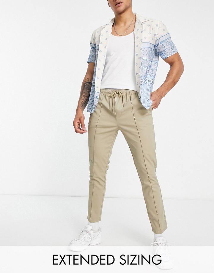 Asos Design Skinny Chinos With Pin Tucks And Elasticated Waist In Light Khaki-green