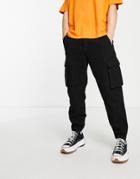 Asos Design Relaxed Tapered Cargo Jeans With Carpenter Detail In Black