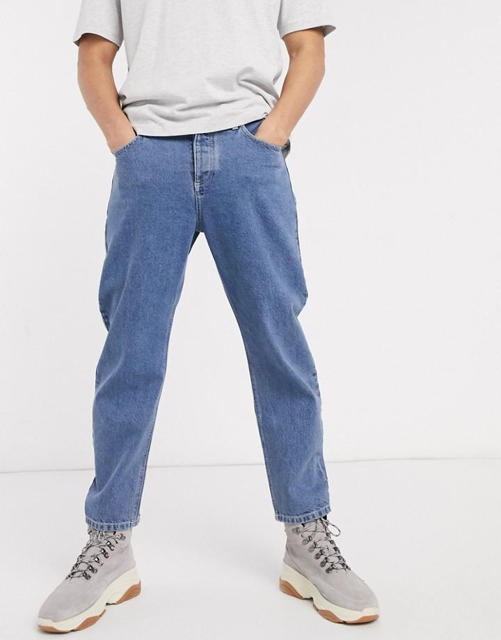 Asos Design Relaxed Tapered Jeans In Mid Wash Blue-blues