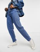 Levi's High Loose Tapered Leg Jeans In Mid Wash-blues