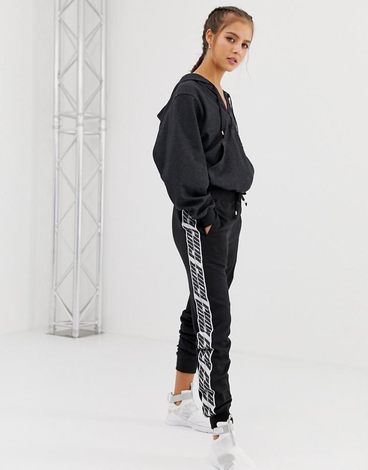 Puma Taped Sweatpants In Black - Black