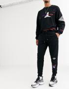 Asos Design Two-piece Tapered Jogger In Black With Multi Print Placements