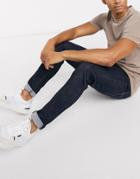 Levi's Skinny Tapered Fit Jeans In Cleaner Advanced Dark Rinse-blues