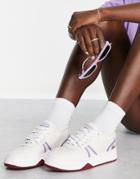 Lacoste L001 Court Sneakers With Contrast Sole In White/purple