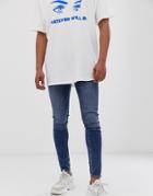Cheap Monday Him Spray Super Skinny Jeans In Mid Blue - Blue