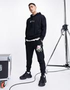 Asos Design Organic Blend Lightweight Slim Joggers In Black With Floral Print - Part Of A Set