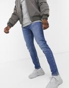 Levi's Youth 502 Tapered Hi Ball Jeans In Hawthorne Wind Mid Wash-blues
