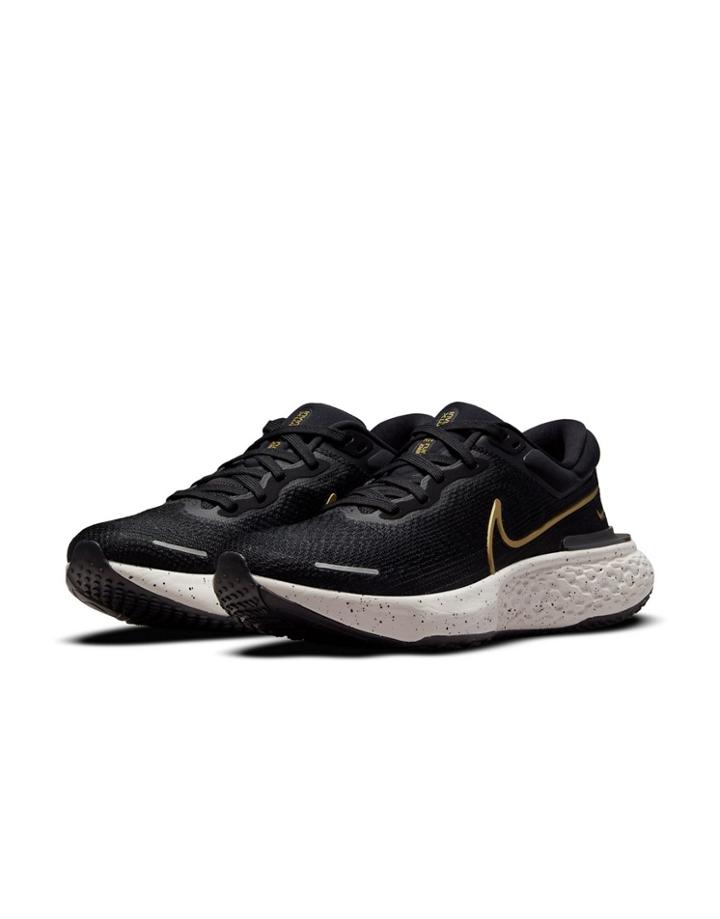 Nike Running Zoomx Invincible Run Flyknit Sneakers In Black/metallic Gold