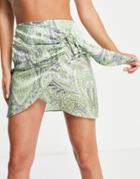 Asos Design Satin Drape Buckle Mini Skirt In Paisley Print-multi