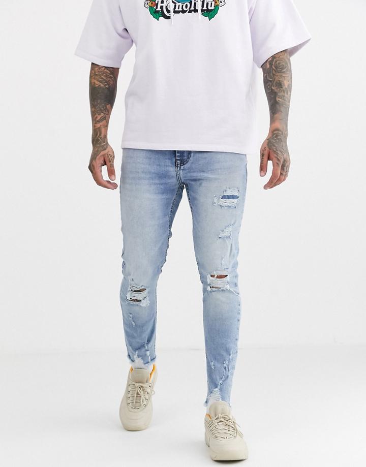 Bershka Skinny Jeans With Rip And Repair In Light Blue Wash