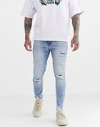 Bershka Skinny Jeans With Rip And Repair In Light Blue Wash