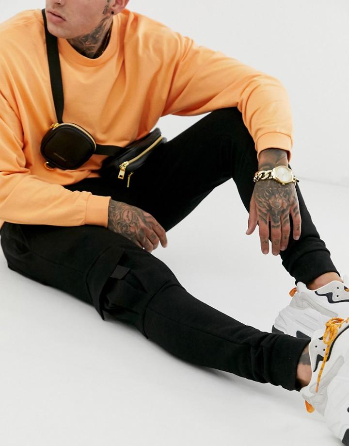 Asos Design Skinny Sweatpants With Cargo Pocket In Black