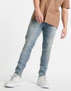 Asos Design Cone Mill Denim Skinny Fit 'american Classic' Jeans In Vintage Mid Wash With Raw Hem-blues