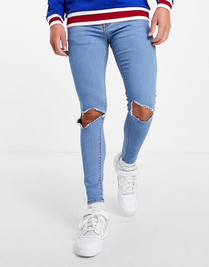 Asos Design Spray On Jeans With Power Stretch In Light Stone Wash With Open Knee Rips-blues