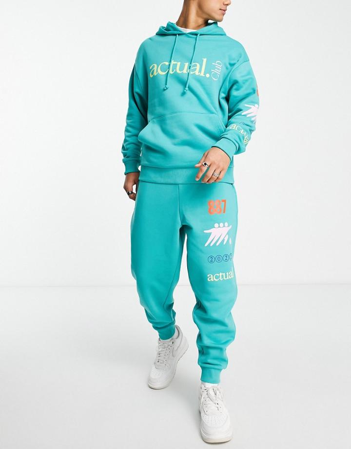 Asos Actual Relaxed Sweatpants With Actual Club Multi Prints In Green - Part Of A Set