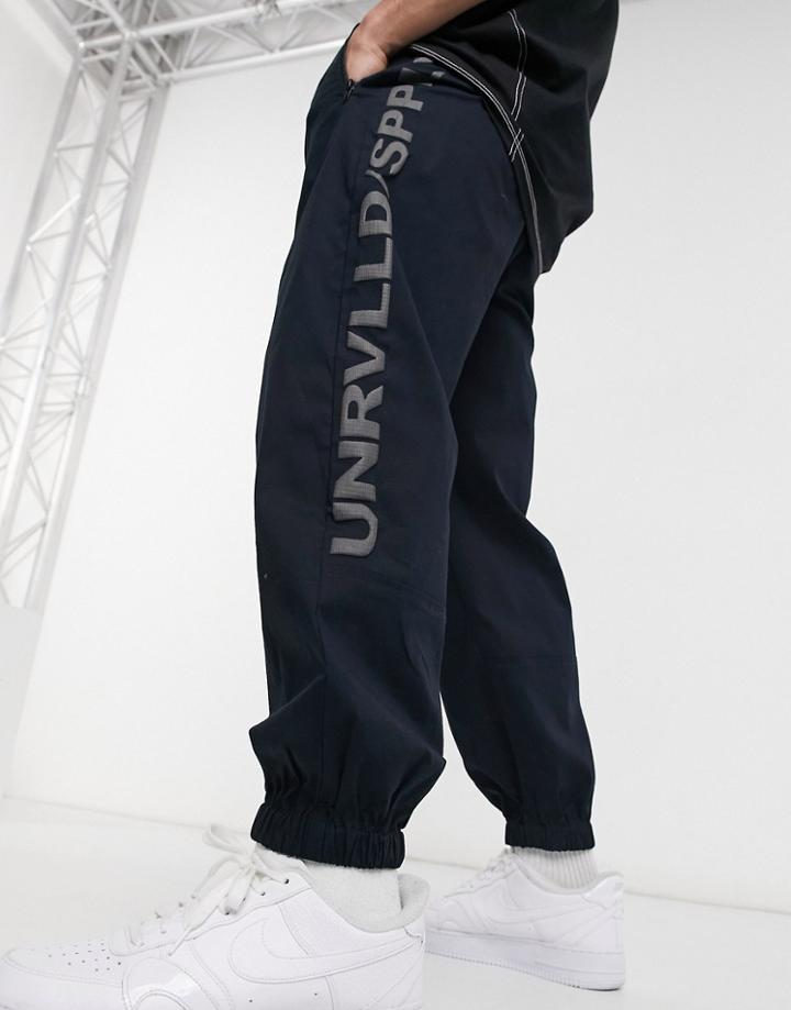 Asos Unrvlld Spply Oversized Tapered Sweatpants In Blue-navy