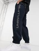 Asos Unrvlld Spply Oversized Tapered Sweatpants In Blue-navy