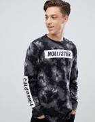Hollister Acid Wash Long Sleeve Top Front And Sleeve Logo In Black - Black