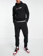 Tommy Hilfiger Performance Essentials Logo Cuffed Sweatpants In Black