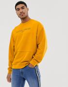 Asos Design Oversized Sweatshirt Withreverse Loopback Panel With Text Print In Yellow - Yellow