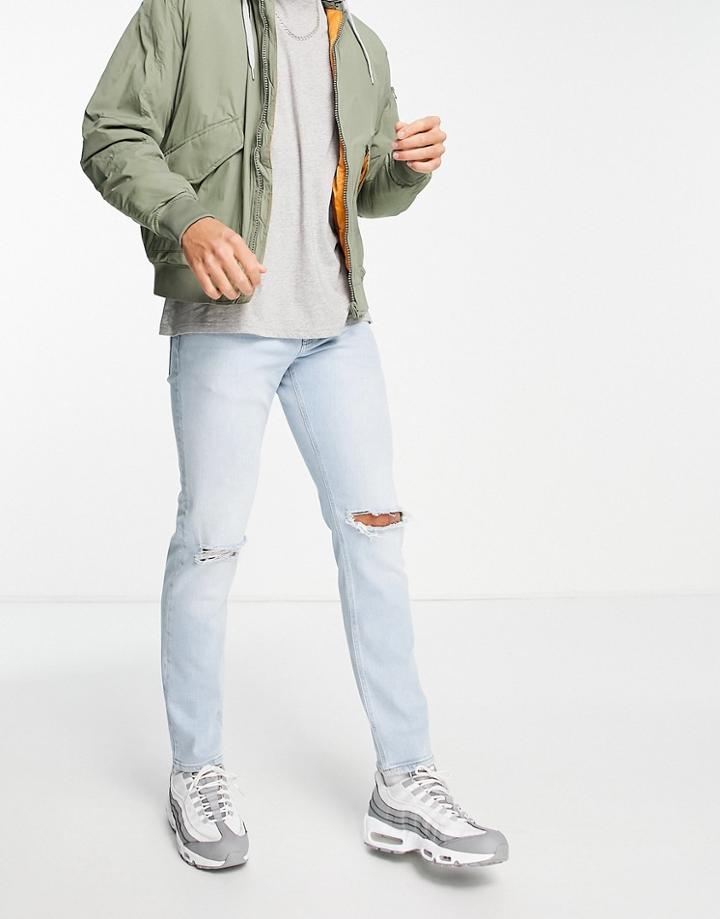 Asos Design Stretch Slim Jeans In Light Wash With Knee Rips-blue