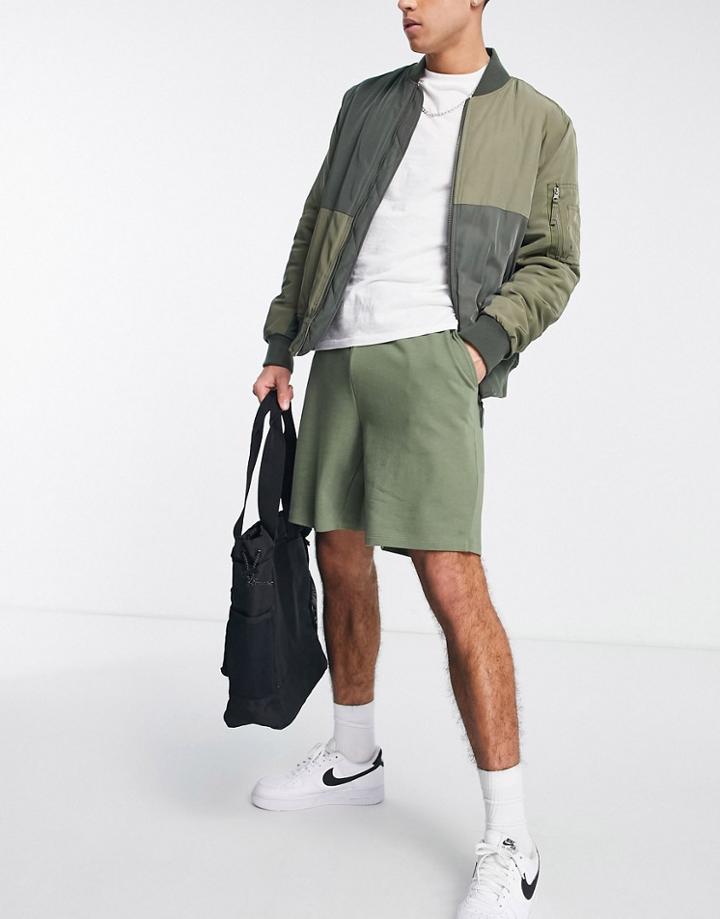 Asos Design Oversized Jersey Shorts In Khaki-green