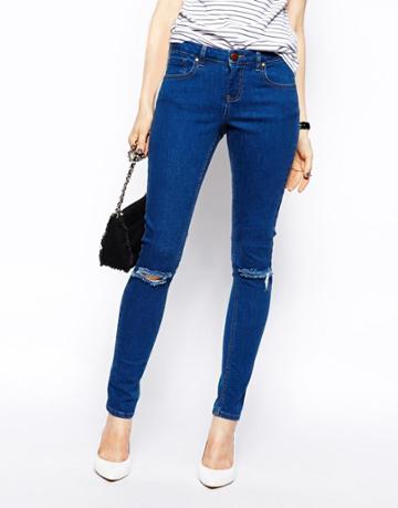 Asos Whitby Low Rise Skinny Jeans In Rich Dark Wash Blue With Ripped Knees