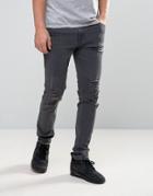 Asos Skinny Jeans With Heavy Rips In Washed Black - Black