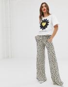 Love Moschino Daisy Print Flared Pants - Yellow