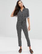 Unique 21 Button Front Printed Jumpsuit - Black Grid Print