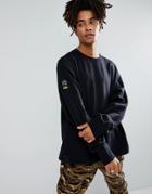 Puma X Xo Oversized Crew Neck Sweatshirt In Black 57534701 - Black
