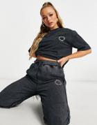 Asos Weekend Collective Oversized Sweatpants With Pink Logo In Washed Charcoal-grey