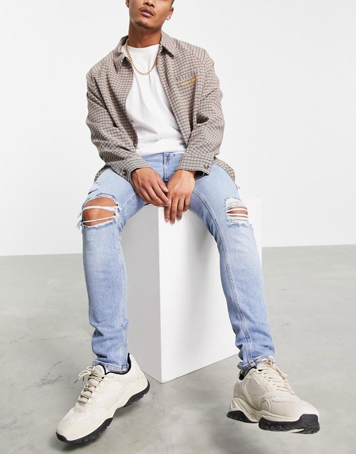 Asos Design Skinny Jeans With 'less Thirsty' Wash In Light Blue With Rips-blues