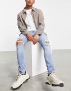 Asos Design Skinny Jeans With 'less Thirsty' Wash In Light Blue With Rips-blues