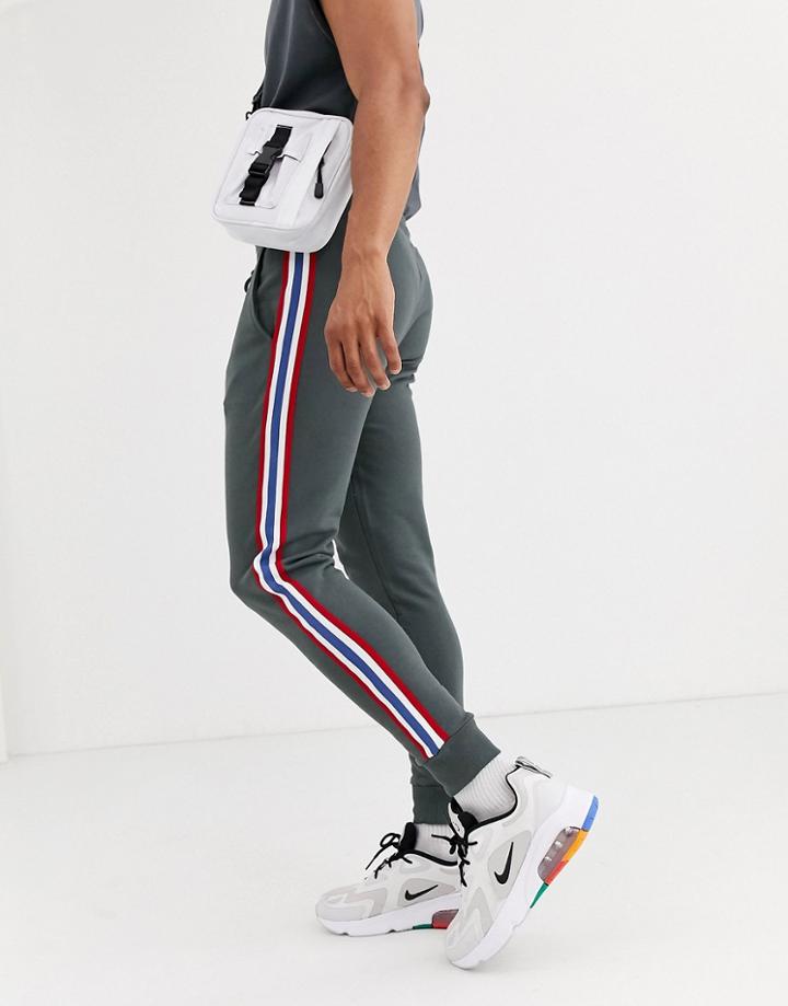 Asos Design Skinny Sweatpants In Washed Black With Side Tape