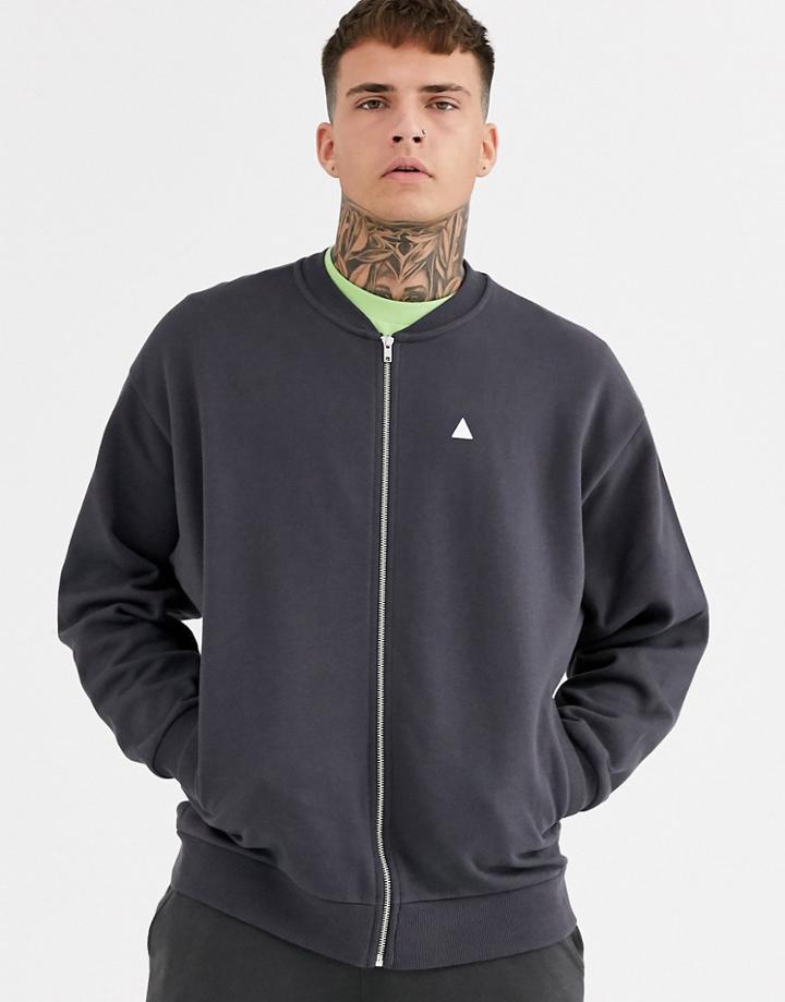 Asos Design Oversized Jersey Bomber Jacket In Washed Black With Triangle