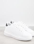 Truffle Collection Sneakers In White With Black Tab
