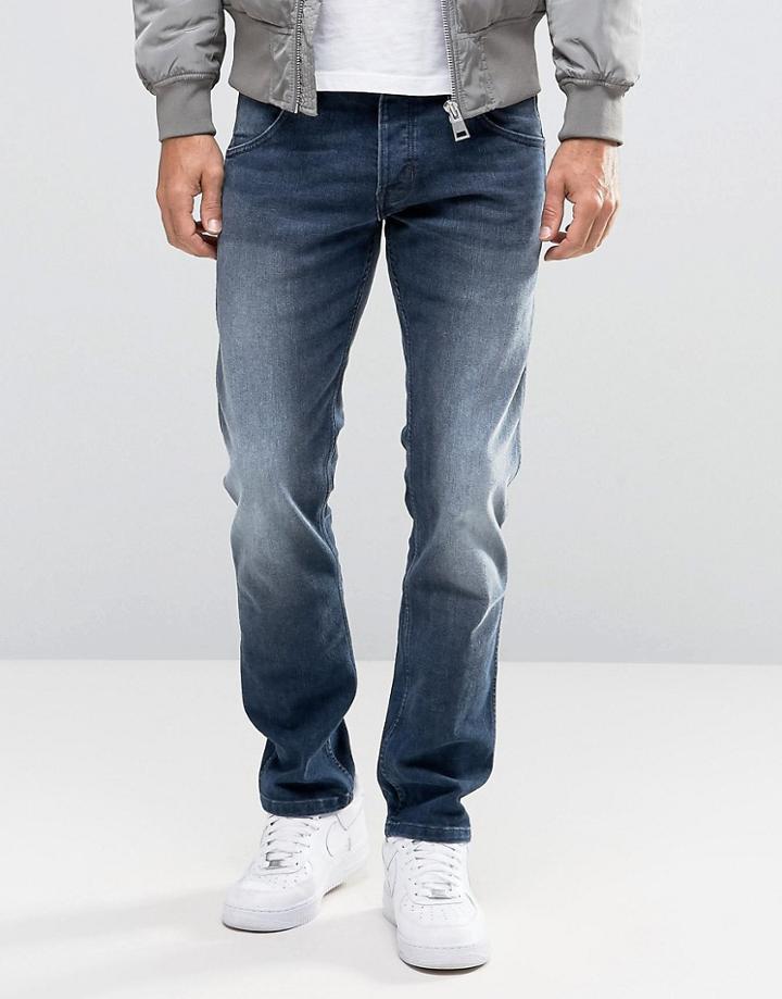 Wrangler Low Rise Slim Leg Jean In Fuzzy Duck Wash - Blue