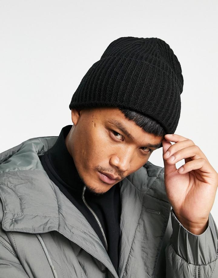 Asos Design Lambswool Oversized Beanie In Black