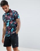 Asos Design Polo With All Over Hawaiian Floral Print And Tipped Collar In Pique - Black