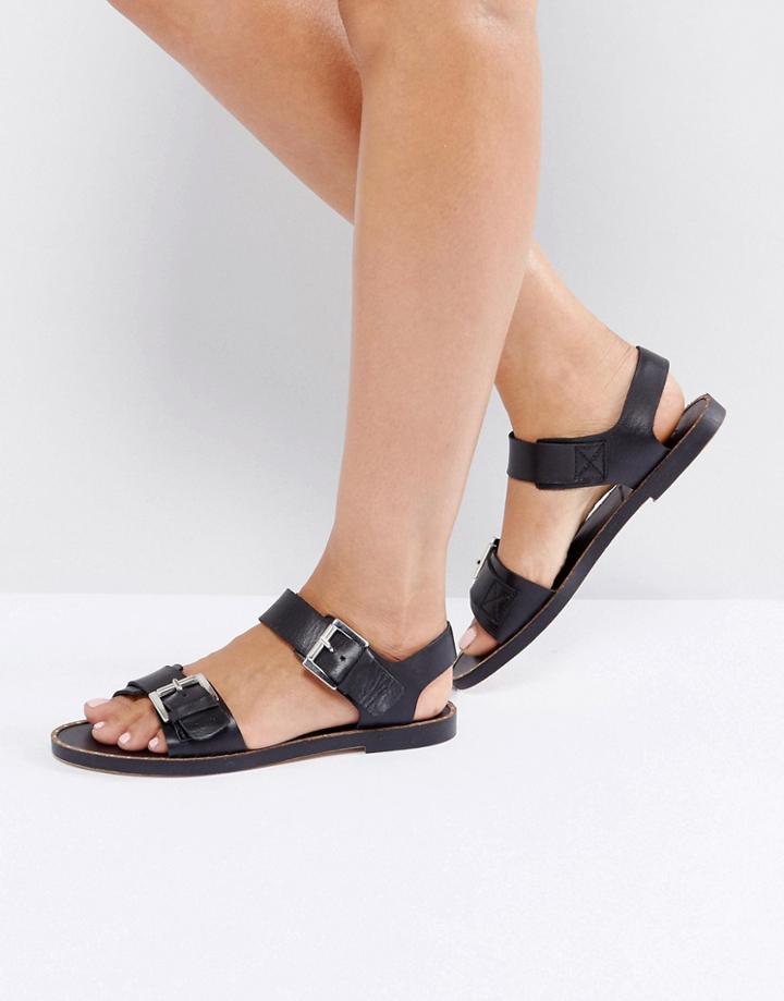 Depp Stud Sole Buckle Flat Leather Sandal - Black