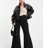 Asos Design Curve Edit Holding Power Rib Flare Pants In Black