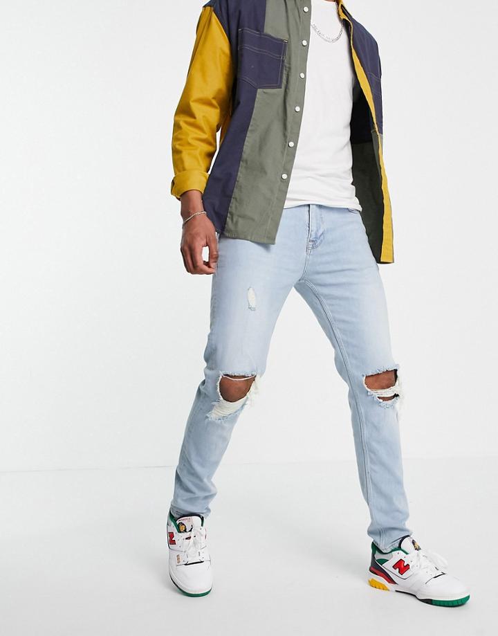 Asos Design Skinny Jeans With Knee Rips In Light Wash Blue-blues
