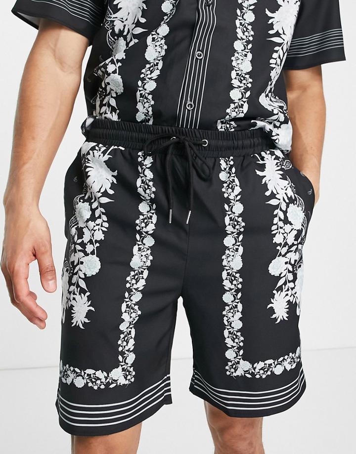 Mennace Printed Border Shorts In Black