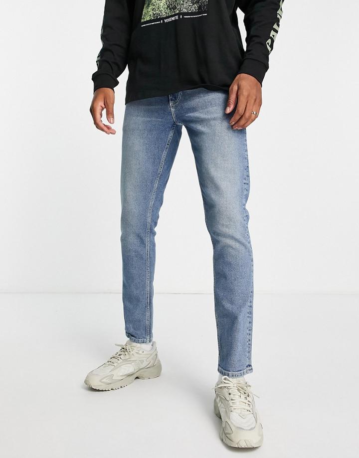 Asos Design Stretch Slim Jeans In Tinted Mid Wash-blue