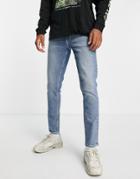 Asos Design Stretch Slim Jeans In Tinted Mid Wash-blue