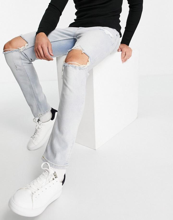 Asos Design Stretch Slim Jeans In Vintage Light Wash With Knee Rips-blues
