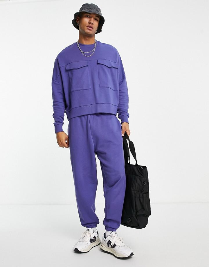 Asos Design Cropped Sweatshirt With Utility Pockets In Purple - Part Of A Set-blues