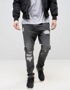 Asos Drop Crotch Stacker Jeans With Rips In Washed Black - Black
